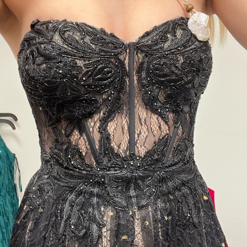 blk poshmark prom dress with gold detailing. black beading and sequins.